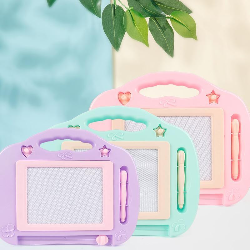 Colorful magnetic drawing boards for kids in pink, purple, and teal with cloud doodle design
