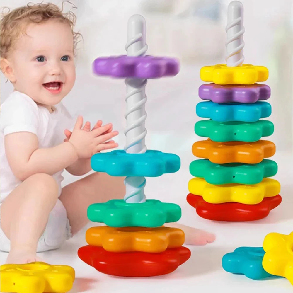 Baby exploring Montessori rainbow stacking toy with bright colorful rings for sensory development